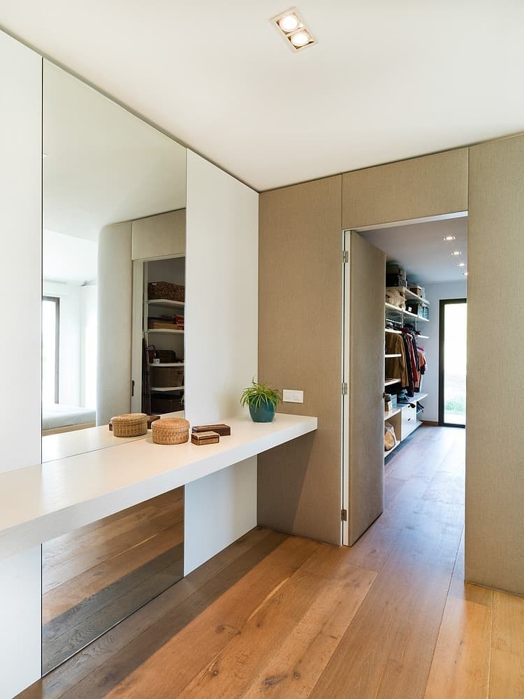 spanish-family-home-with-comfortably-contemporary-open-space-appeal-12-closet.jpg