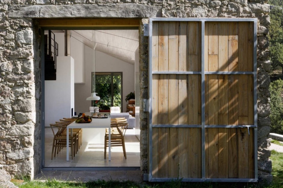 spanish stable turned contemporary stone home 2