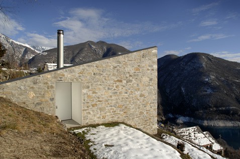 stone house fronts swiss mountains 4