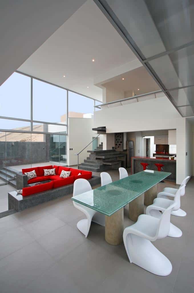 stunning ultramodern beach house with glass walls 13 dining table back