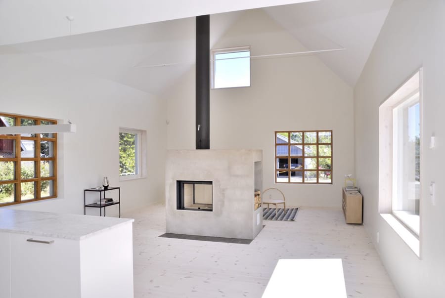 swedish-loft-house-with-concrete-fireplace-feature-2.jpg