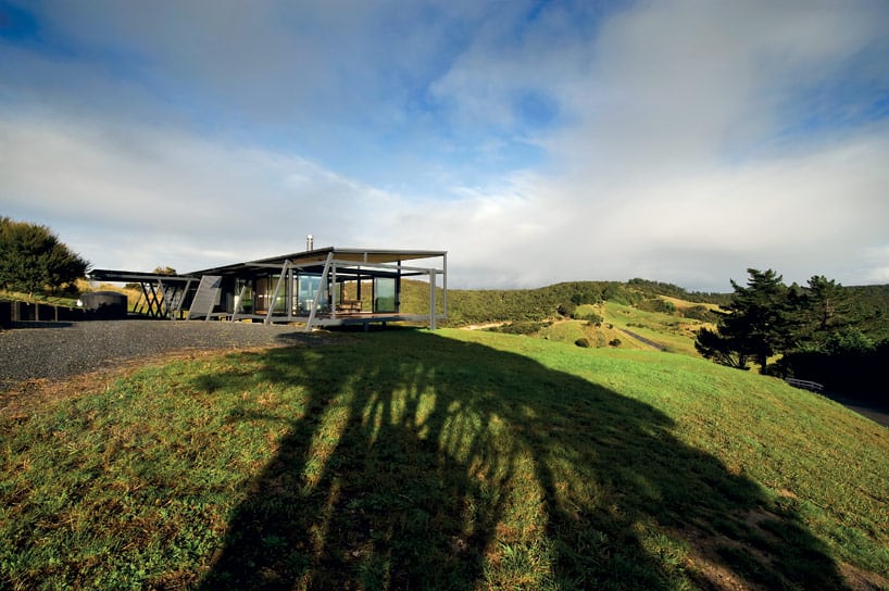 truss style new zealand glass house with complex interior 4 complex side