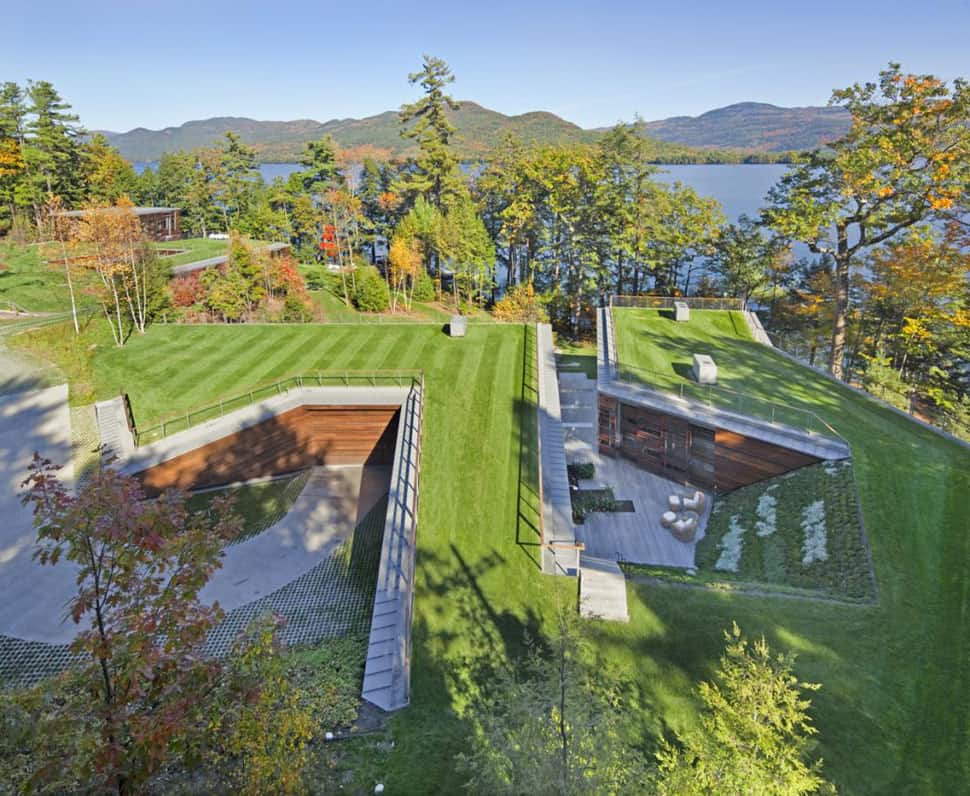 unique underground lake house blends into the landscape 1