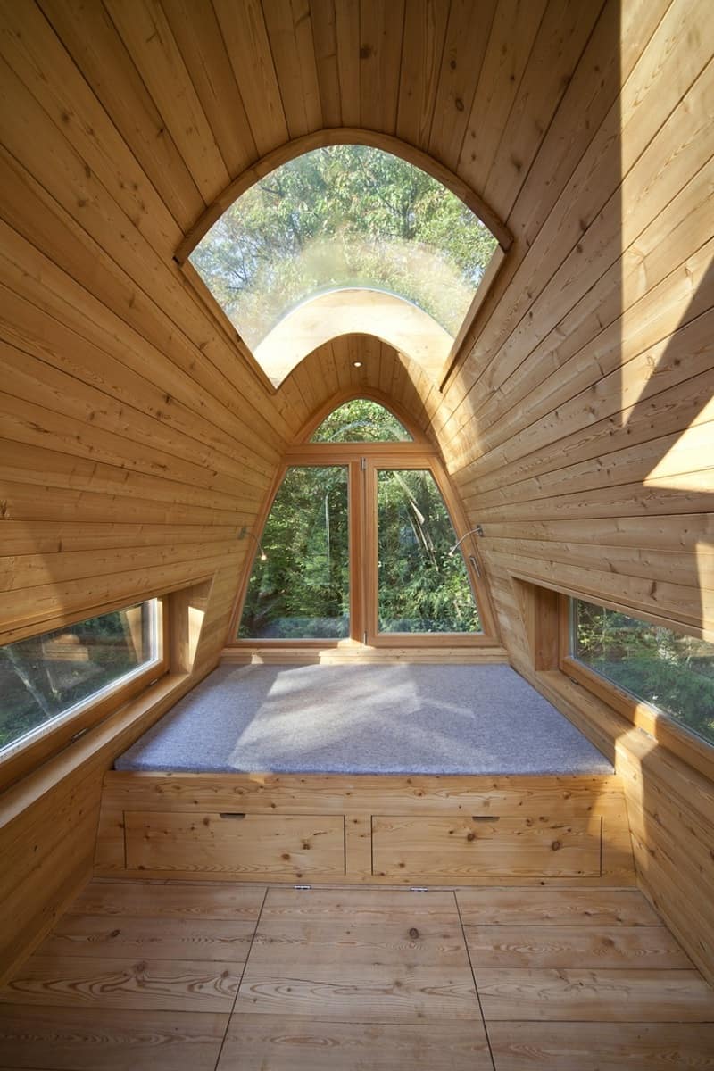 unusual forest cabin on stilts over pond 9 bedroom