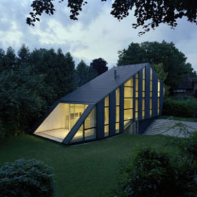 Unusual Shaped House with Glass Facades in German Garden