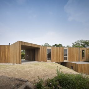 Various Wood Finishes Populate Uniquely Natural Japanese Home
