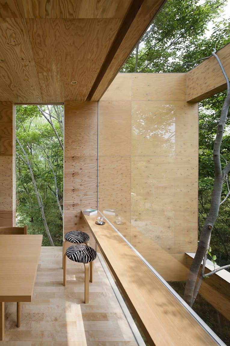 various wood finishes populate uniquely natural japanese home tree
