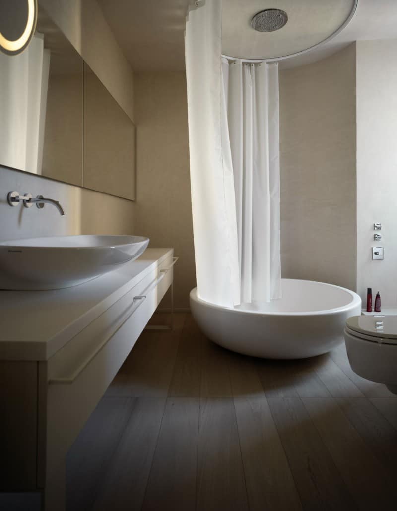 white shades define luxurious multistory milan apartment 13 shower