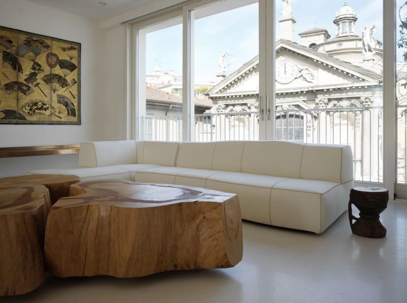 white shades define luxurious multistory milan apartment 3 wood table