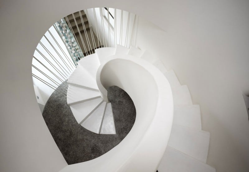 white-shades-define-luxurious-multistory-milan-apartment-7-stairs-down.jpg