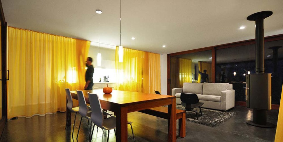 wisconsin cabin house with canary yellow curtain walls 5