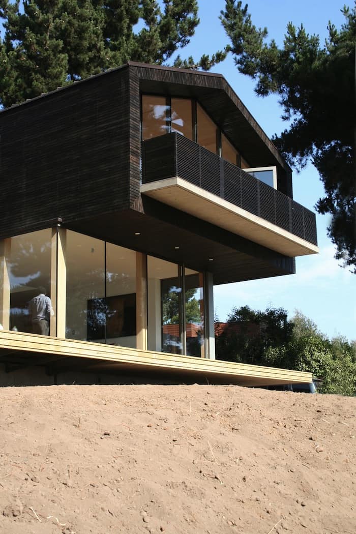 wooden hilltop house sleeps fourteen people 3 front edge day