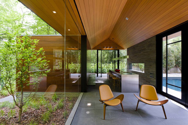 zen style pavilion house with glass walls organic interiors 5