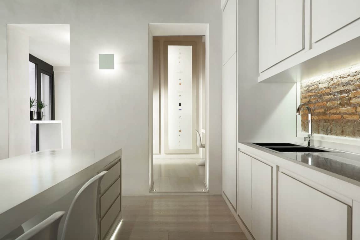 creating personality within white apartment 11 kitchen