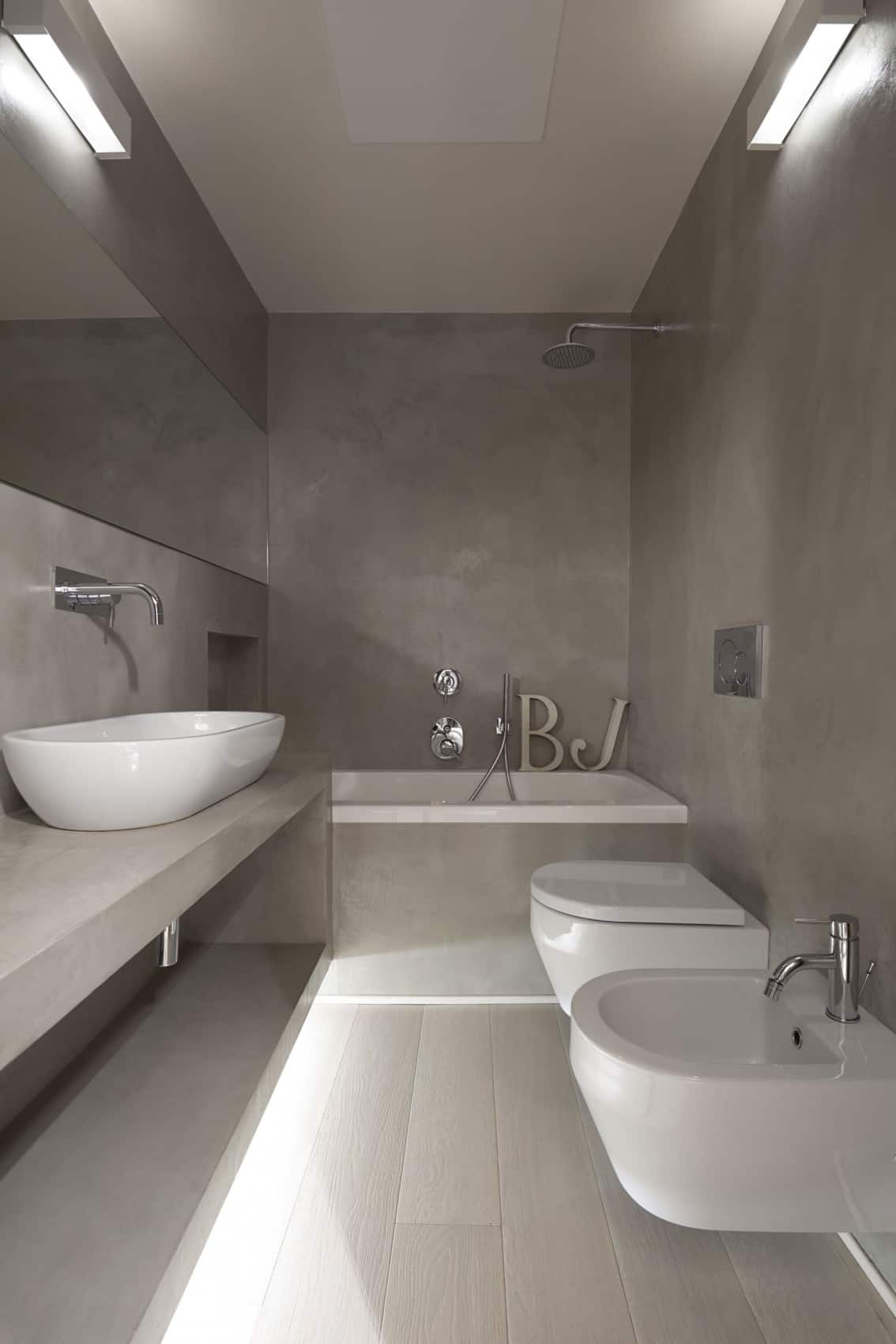 creating personality within white apartment 14 bathroom