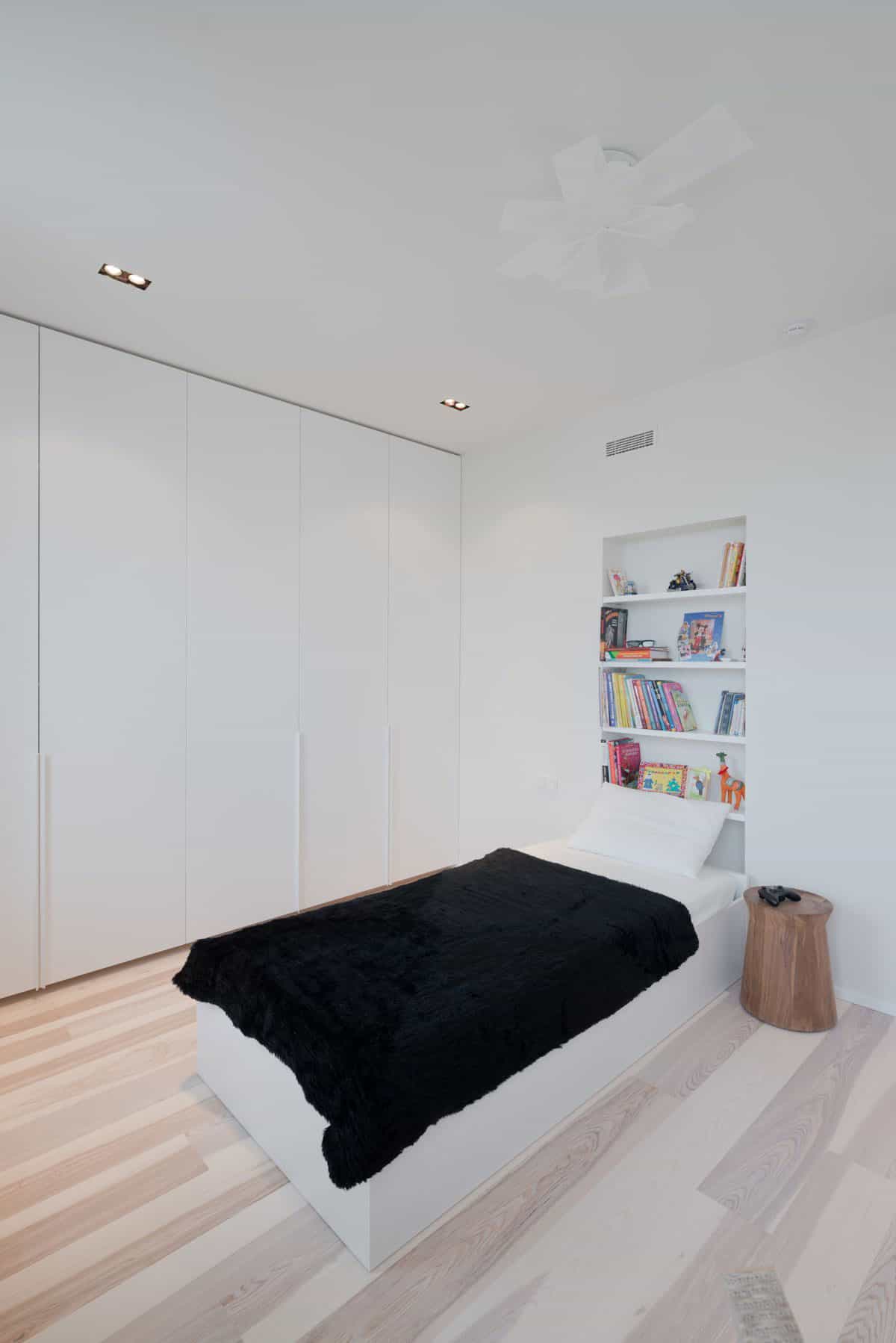 stunning minimalist apartment creatively rethinks form function 5 child bed