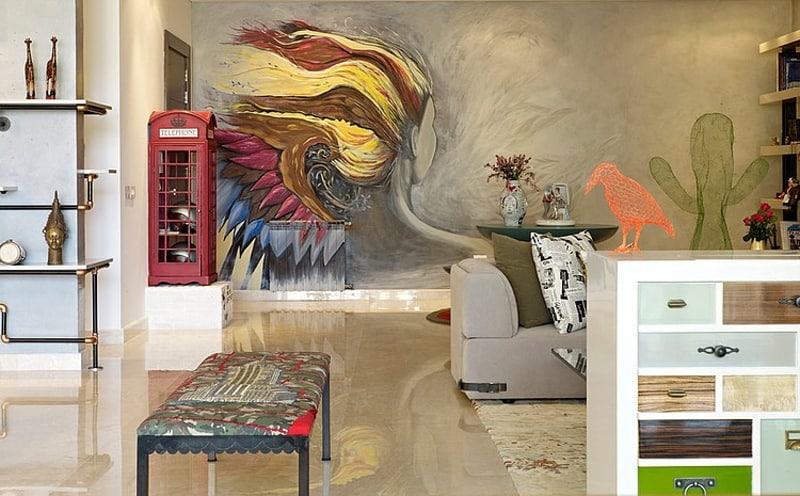 eclectic interior splashed in colorful furniture and art detail 0