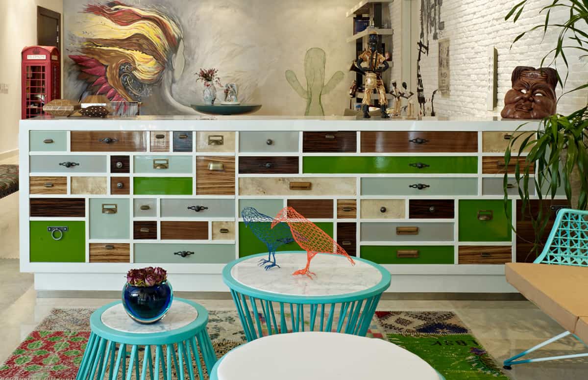 eclectic interior splashed in colorful furniture and art detail 4