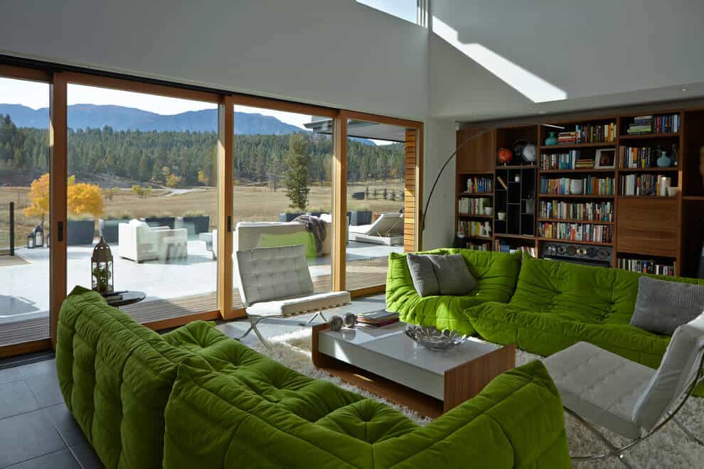 this living room in green and white is so outdoors 3