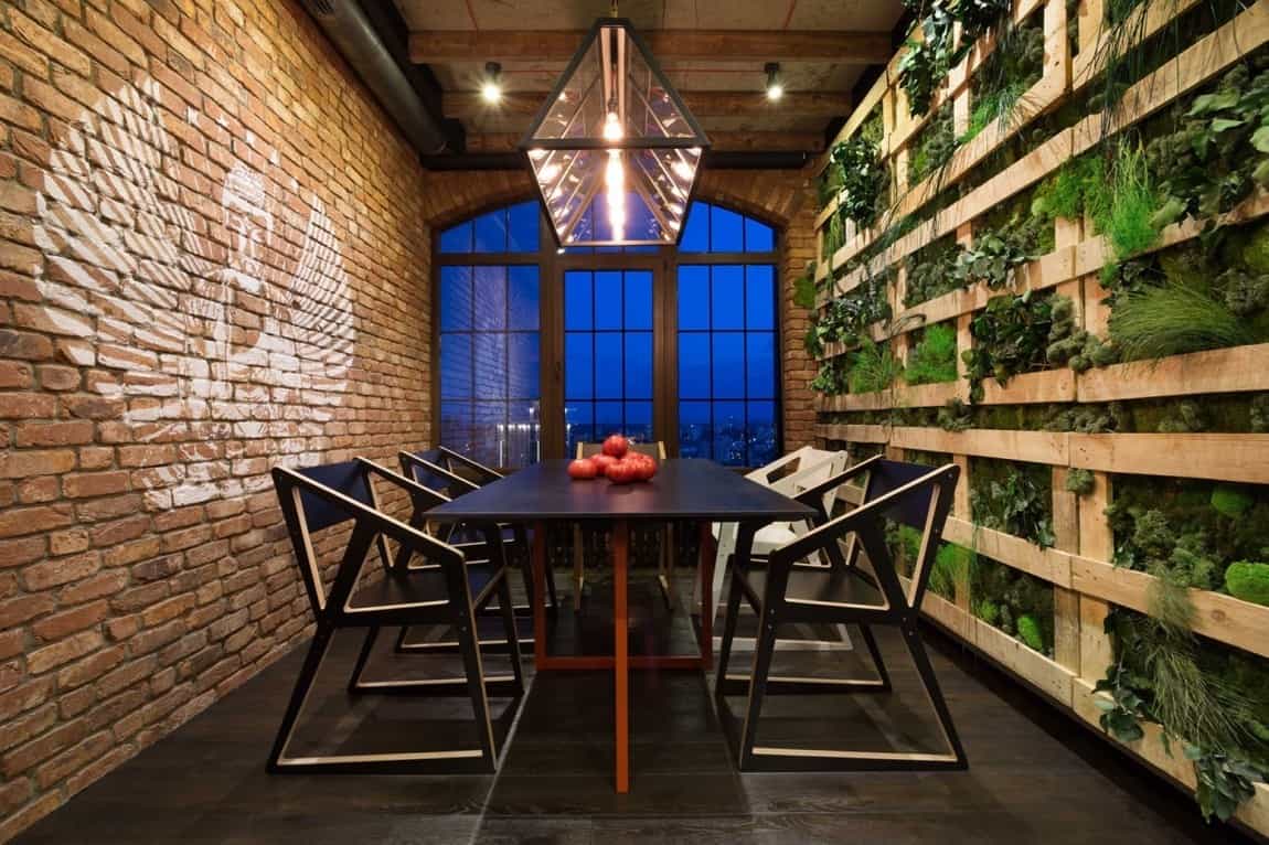 4 green wall and exposed brick dining space
