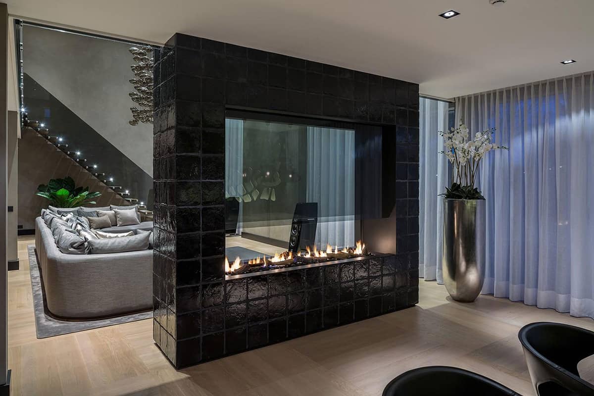 Fireplaces as Room Dividers: 15 Double Sided Design Ideas