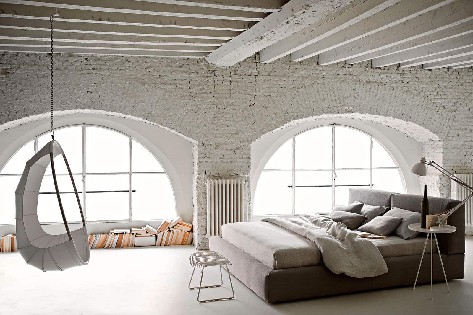country-bedroom-with-exposed-brick-beams-mylo-ivano-redaelli.jpg