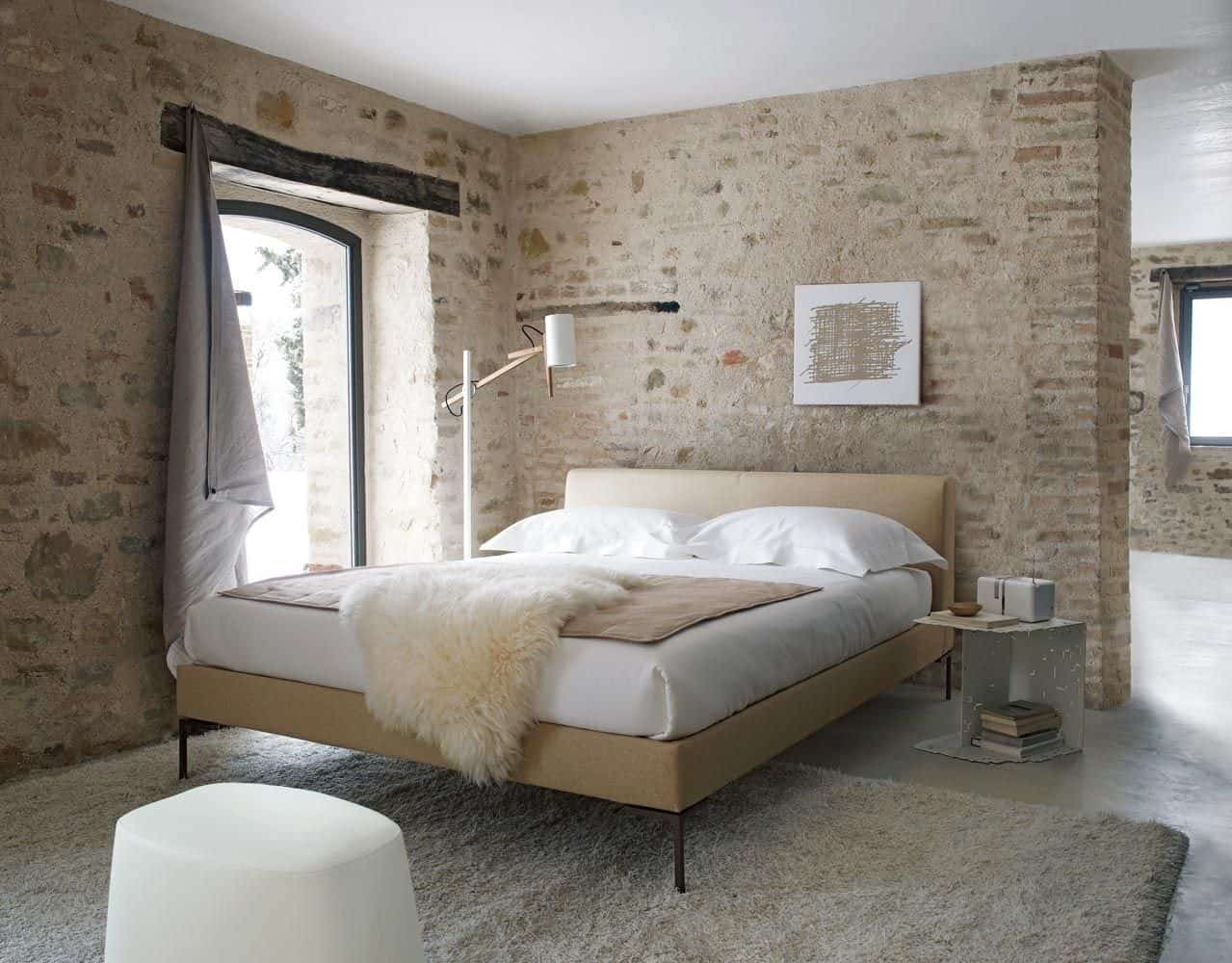 country style bedroom with exposed brick walls bb italia charles