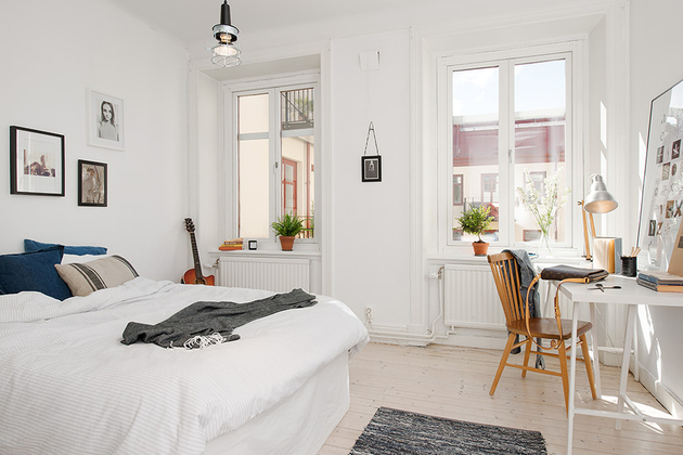 casually-comfortable-decor-driven-apartment-sweden-bedroom.jpg