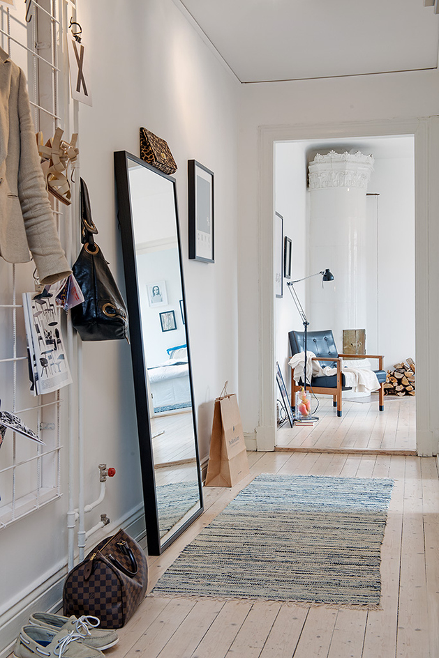 casually-comfortable-decor-driven-apartment-sweden-cross-room-view.jpg
