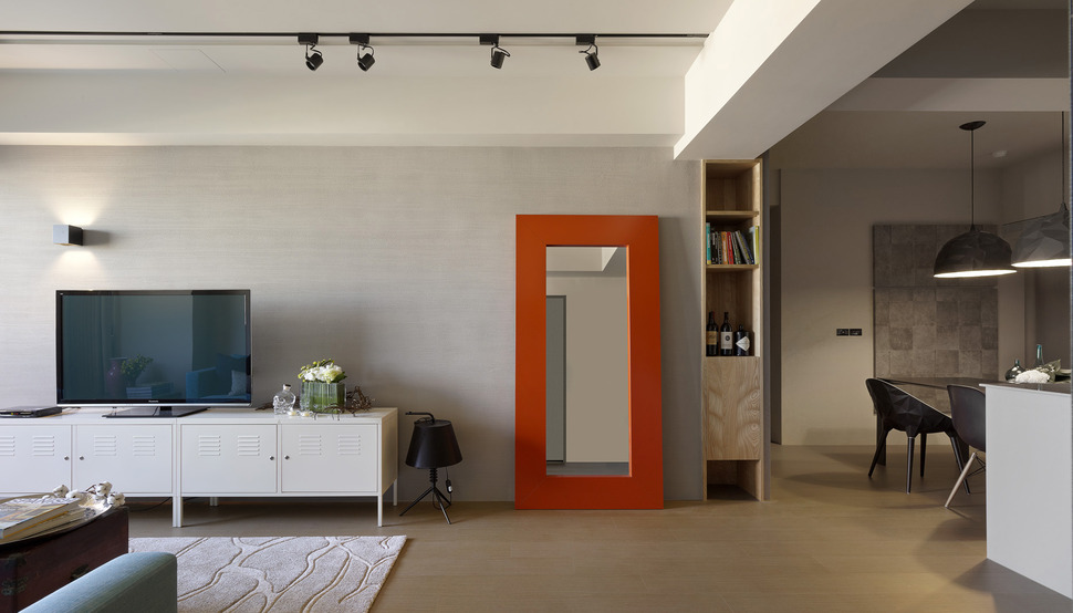 ganna-design-modernizes-a-small-taiwanese-apartment-red-floor-mirror.jpg