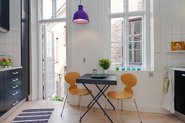 renovated-heirloom-apartment-original-details-modern-decor-9-ant-chairs.jpg