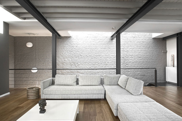 exposed-brick-steel-create-backdrop-contemporary-residence-8-family.jpg