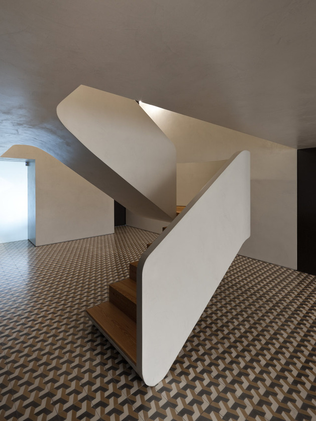 minimalist-home-with-bold-flooring-and-staircase-sculpture-8.jpg