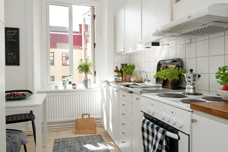casually-comfortable-decor-driven-apartment-sweden-kitchen-counters.jpg