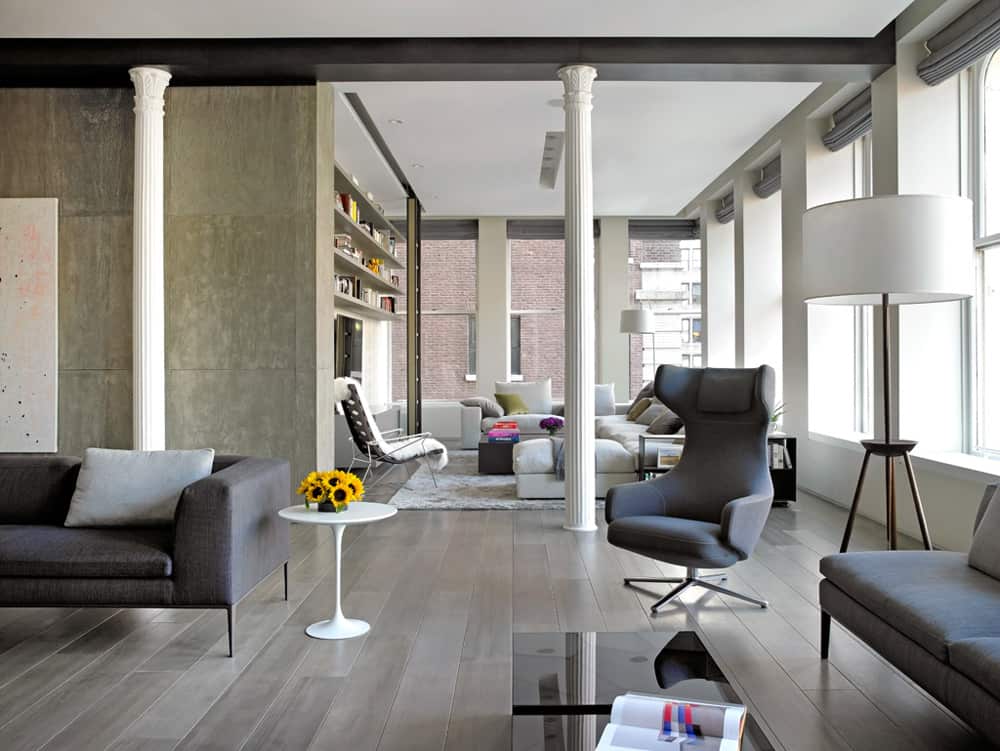 eclectic ny loft combines classical columns and concrete walls 1