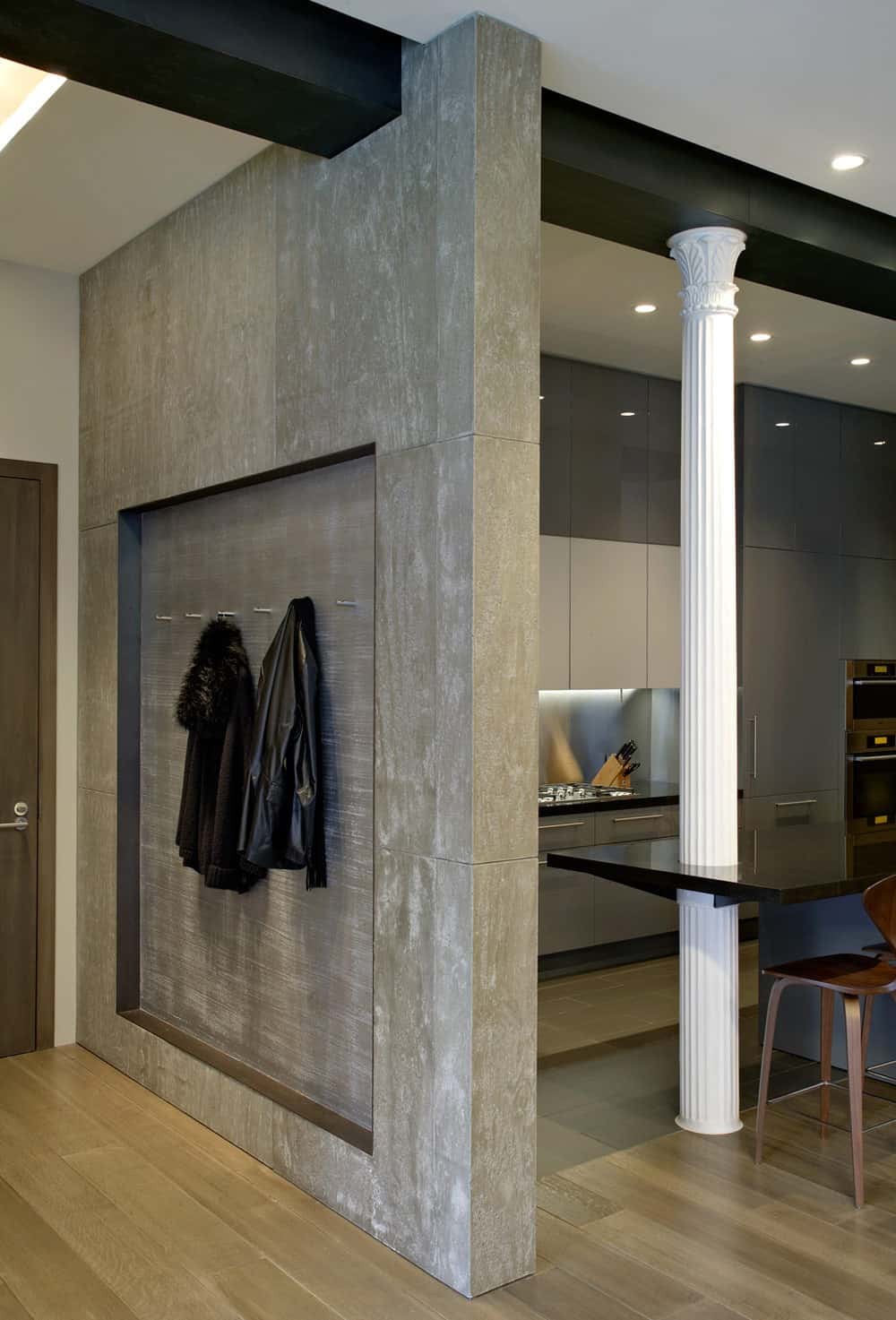 eclectic ny loft combines classical columns and concrete walls 8