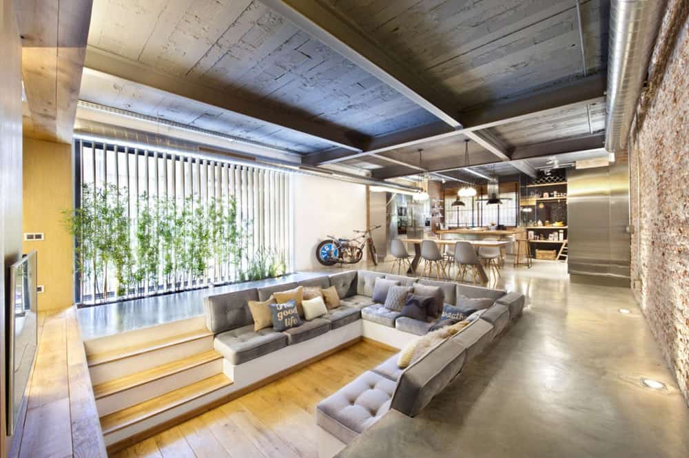 loft with open layout glass walls and privacy gardens 4