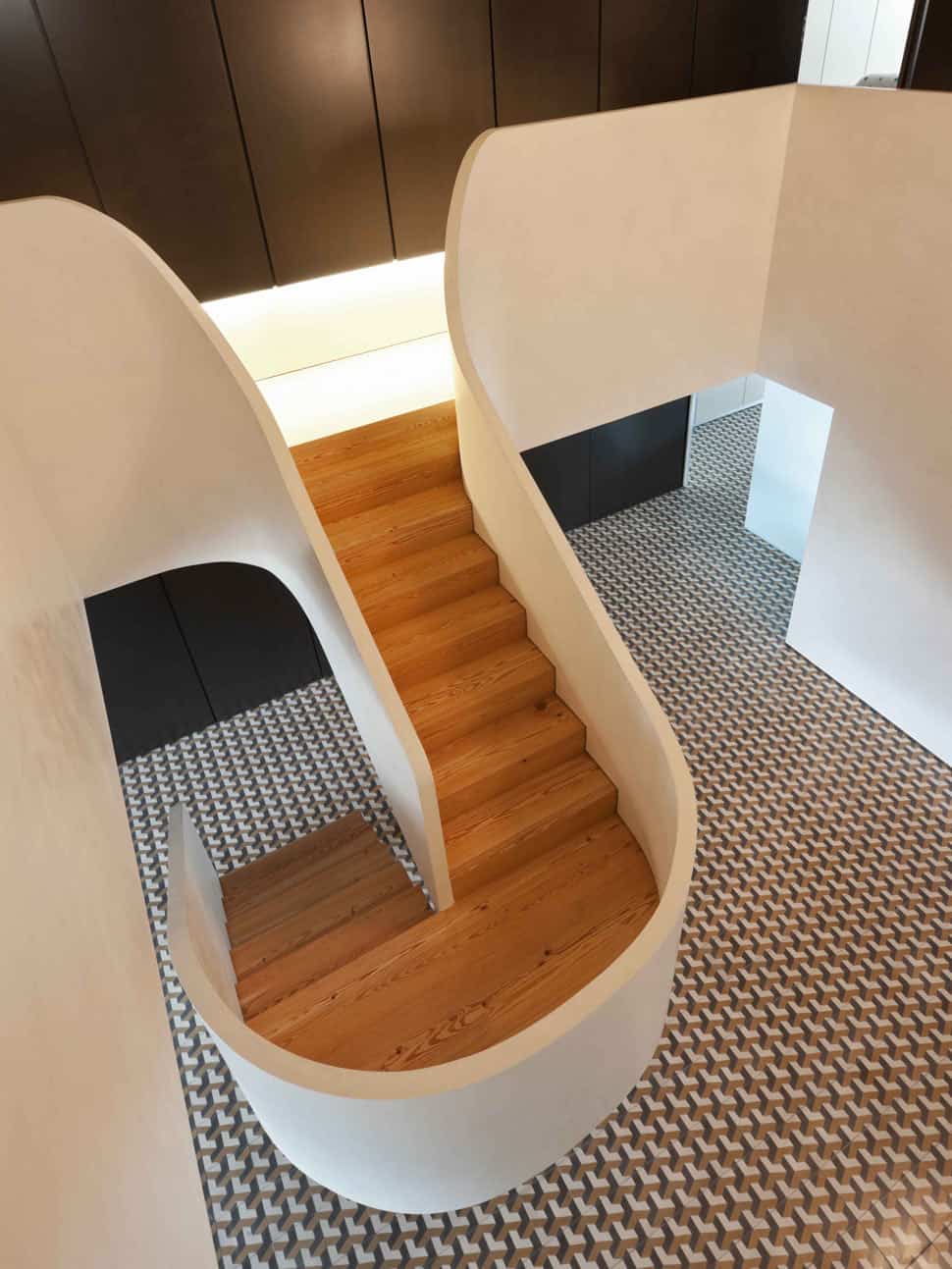 minimalist-home-with-bold-flooring-and-staircase-sculpture-9.jpg