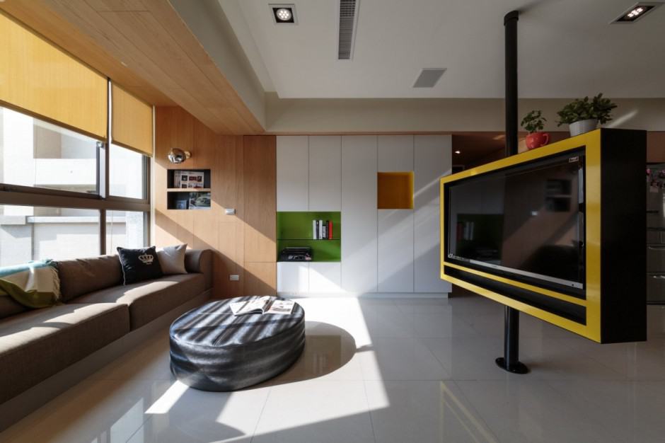 pivoting-tv-turns-playful-apartment-into-entertainment-area-1.jpg