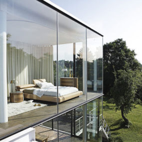 Glass Windows Bedroom Interior with Roche Bobois Anarima Bed