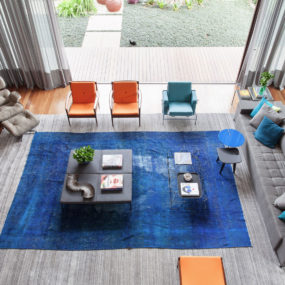 Rug on Rug Decorating Done Right in This Living Room