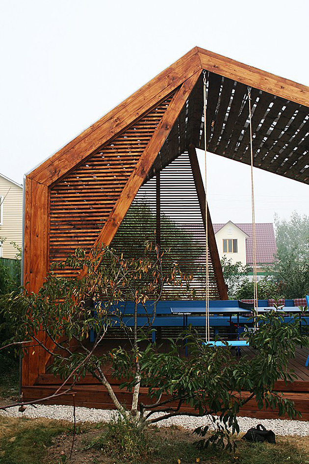 modern-outdoor-pavilion-with-fireplace-and-ping-pong-table-4.jpg