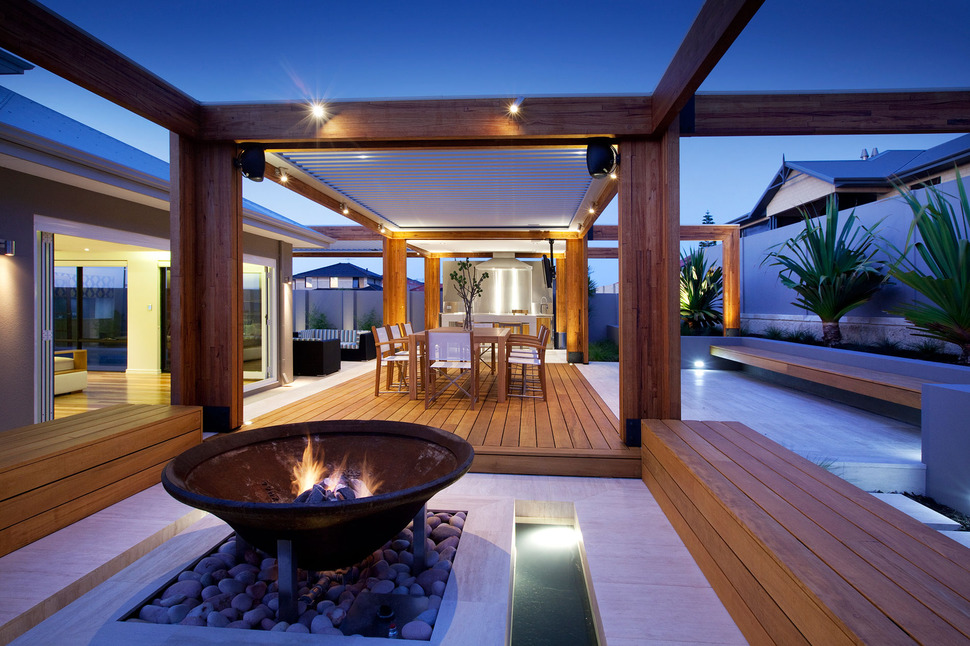 massively-modern-timber-terraces-extend-australian-home-outward-8-fire-dining.jpg