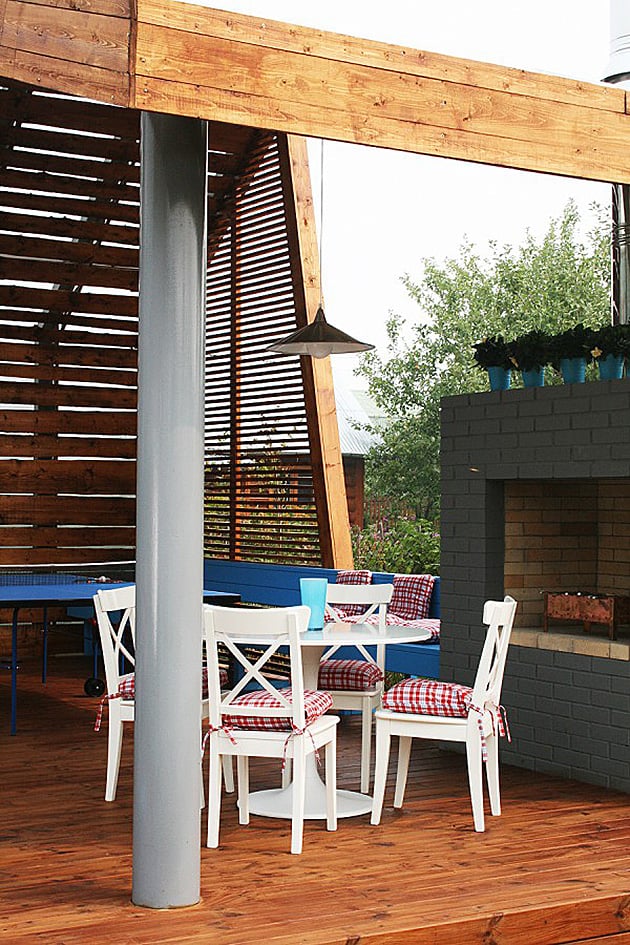 modern outdoor pavilion with fireplace and ping pong table 3