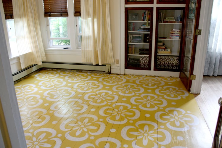 living-room-stenciled-in-dainty-yellow-patterns.jpg